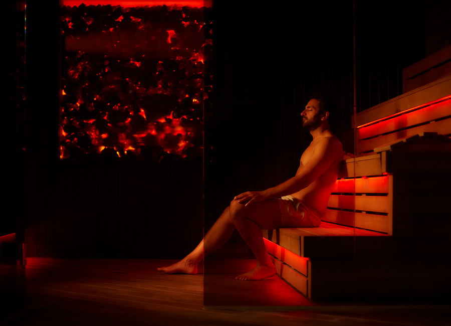 Man relaxing in a Lava Sauna