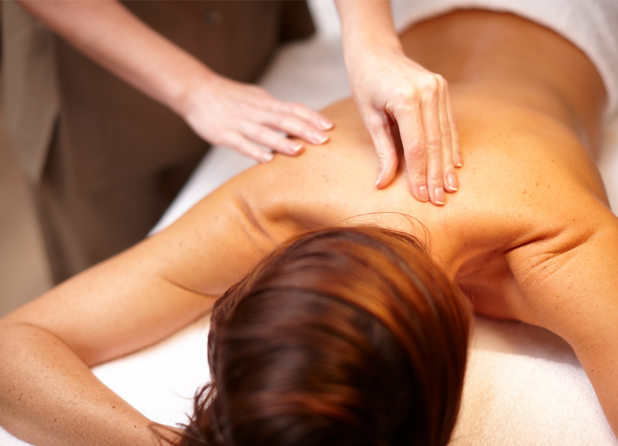 Lady receiving back massage