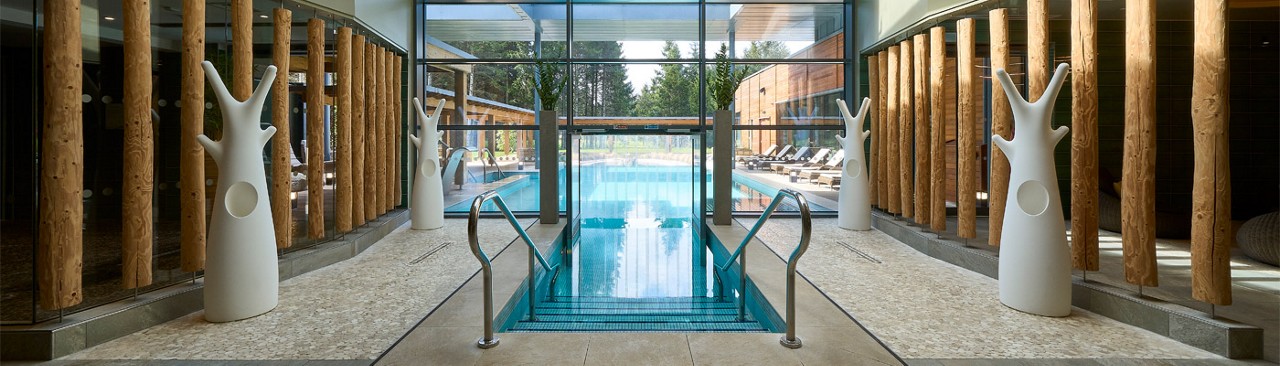 view of pool inside going to outside