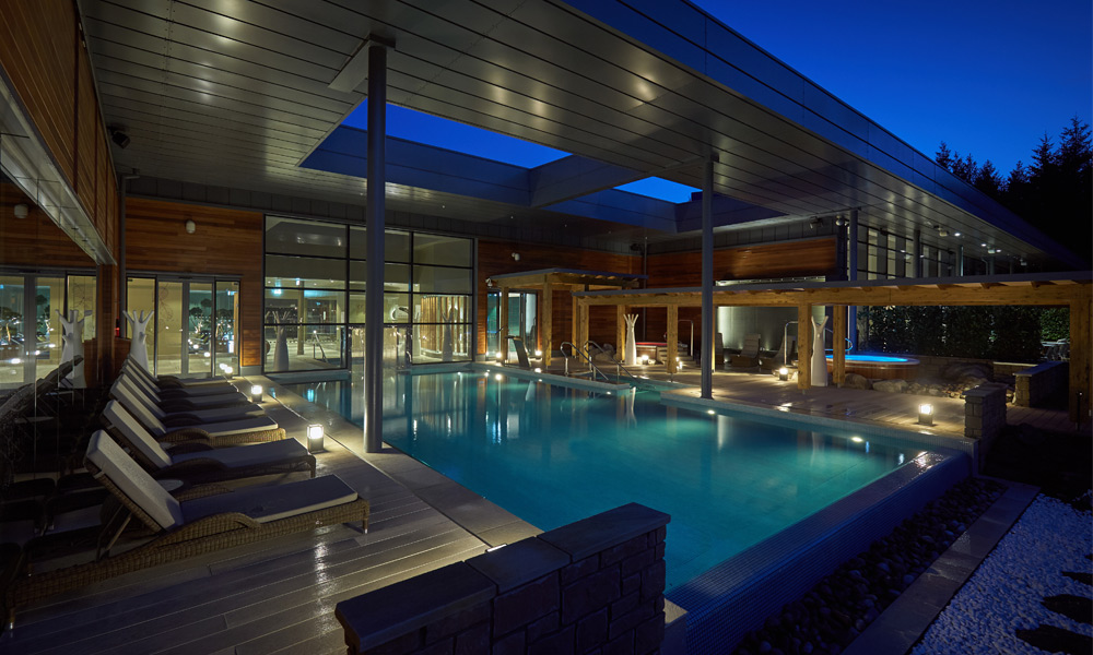 the outdoor pool at night time 