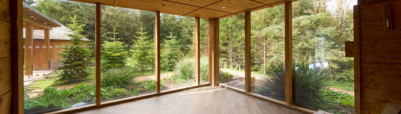 Views of the surrounding forest from within the Nordic Sauna.