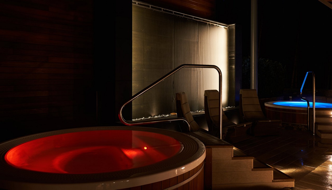 Glowing Hot Tubs in the evening.