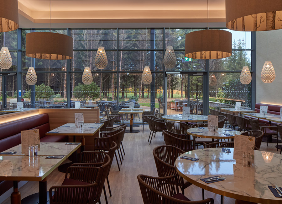 vitale seating area with tables and chairs