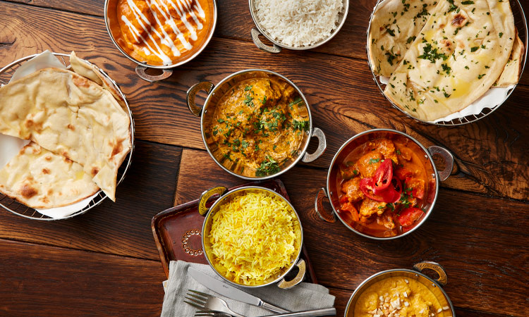 curry dish surrounded by spices