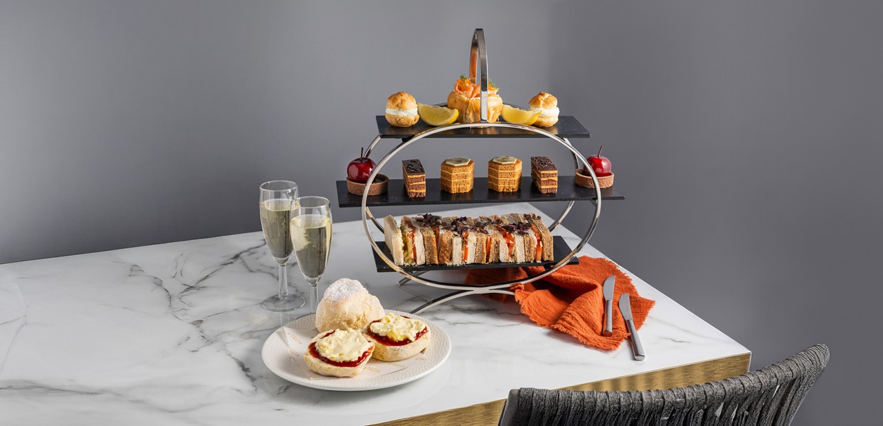 Afternoon Tea served with a glass of Prosecco.