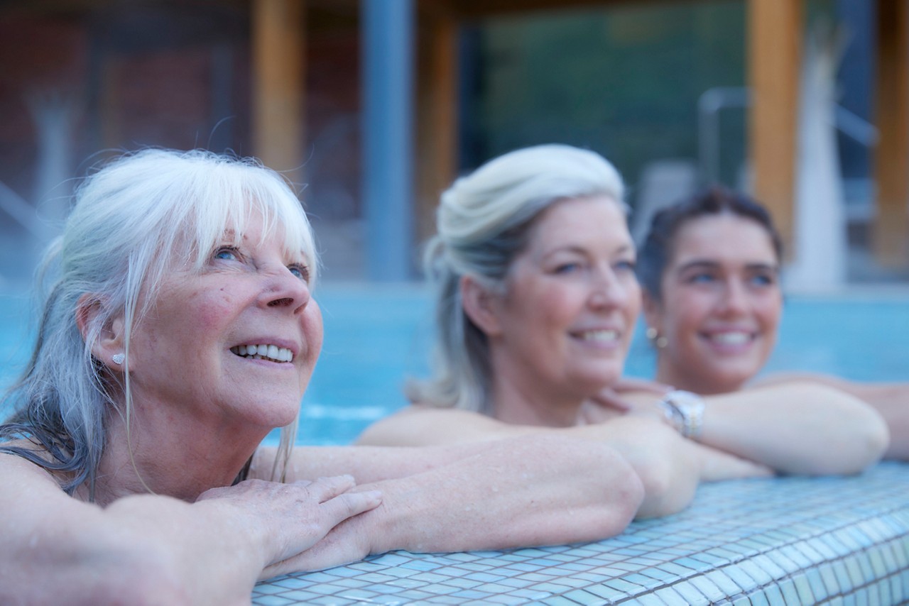 grandma, mum and daughter in the pool