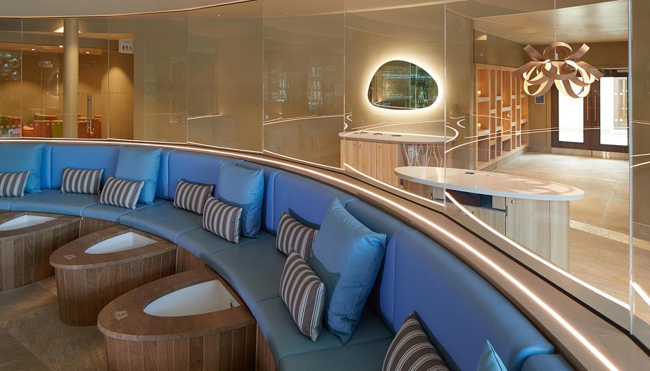 Cushioned seating with individual footbaths.