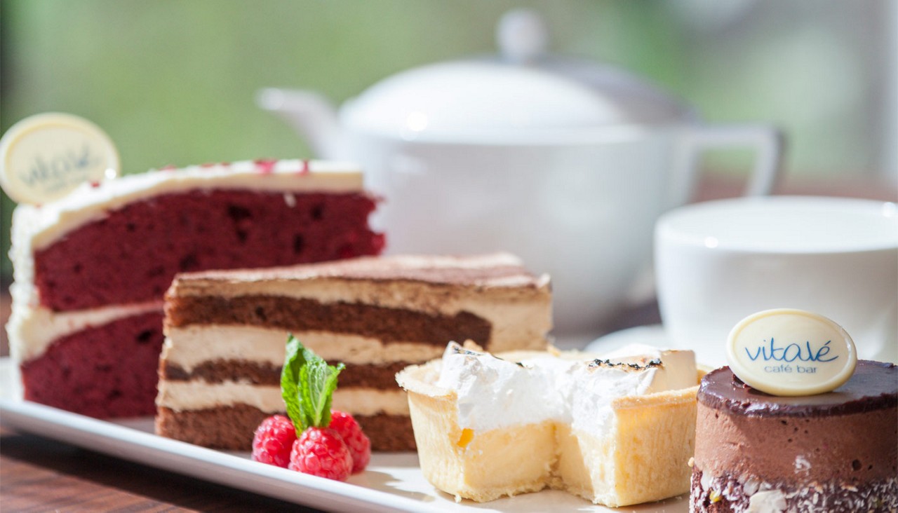 Selection of cakes presented on a platter.